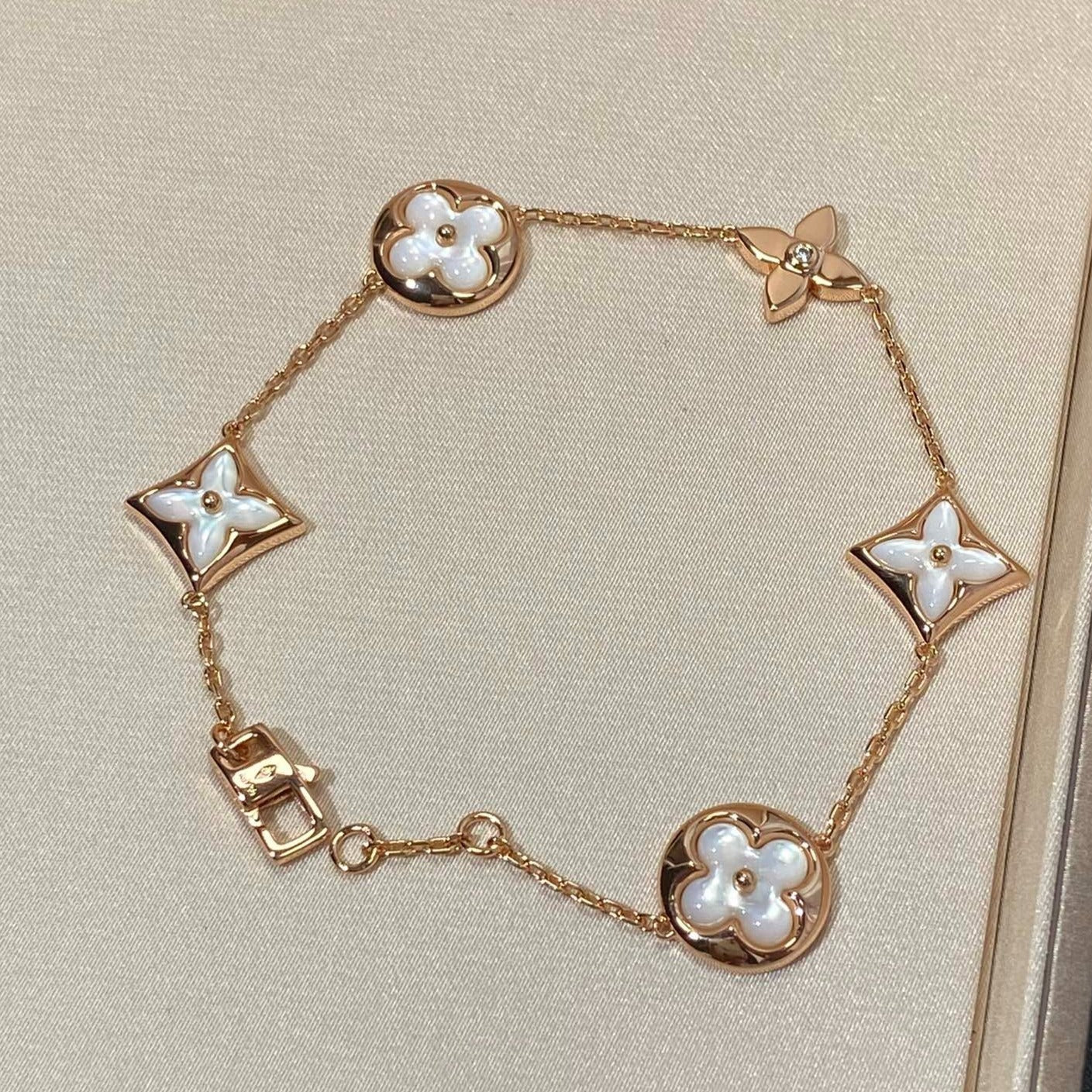 [ELAN LUXE]STAR AND SUN 5 MOTIF MOP PINK GOLD BRACELET