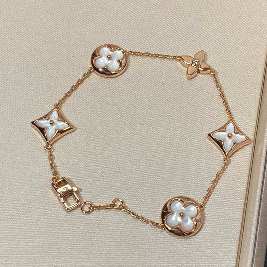[ELAN LUXE]STAR AND SUN 5 MOTIF MOP PINK GOLD BRACELET