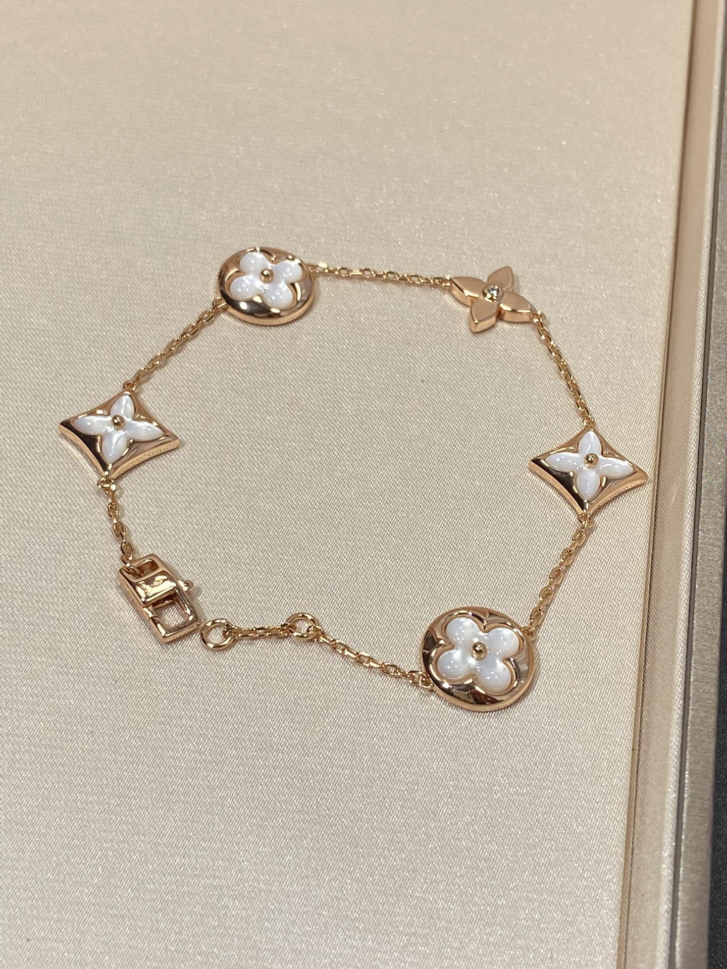 [ELAN LUXE]STAR AND SUN 5 MOTIF MOP PINK GOLD BRACELET