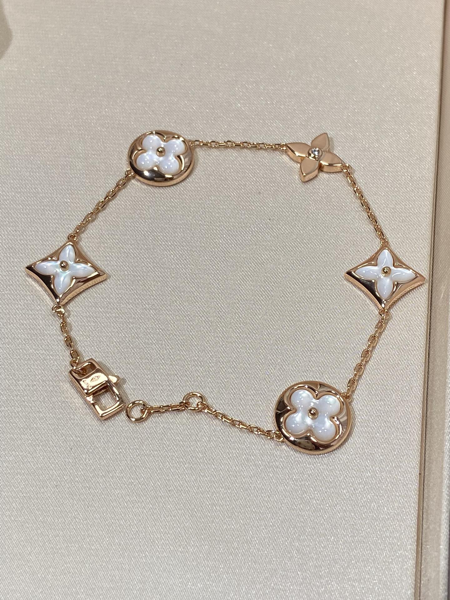[ELAN LUXE]STAR AND SUN 5 MOTIF MOP PINK GOLD BRACELET
