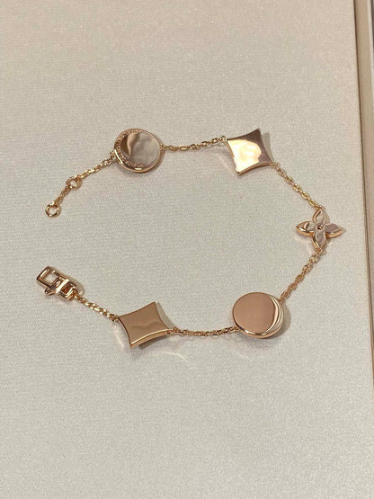 [ELAN LUXE]STAR AND SUN 5 MOTIF MOP PINK GOLD BRACELET