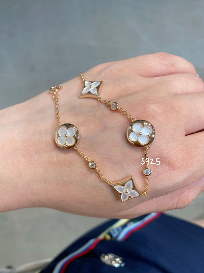 [ELAN LUXE]STAR AND SUN 4 MOTIF WHITE MOP PINK GOLD BRACELET