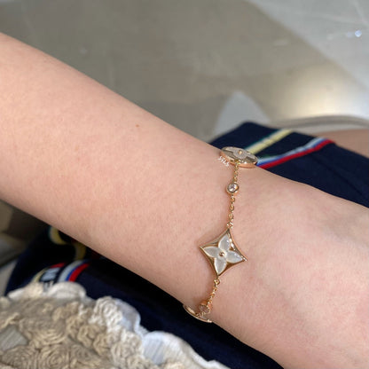 [ELAN LUXE]STAR AND SUN 4 MOTIF WHITE MOP PINK GOLD BRACELET