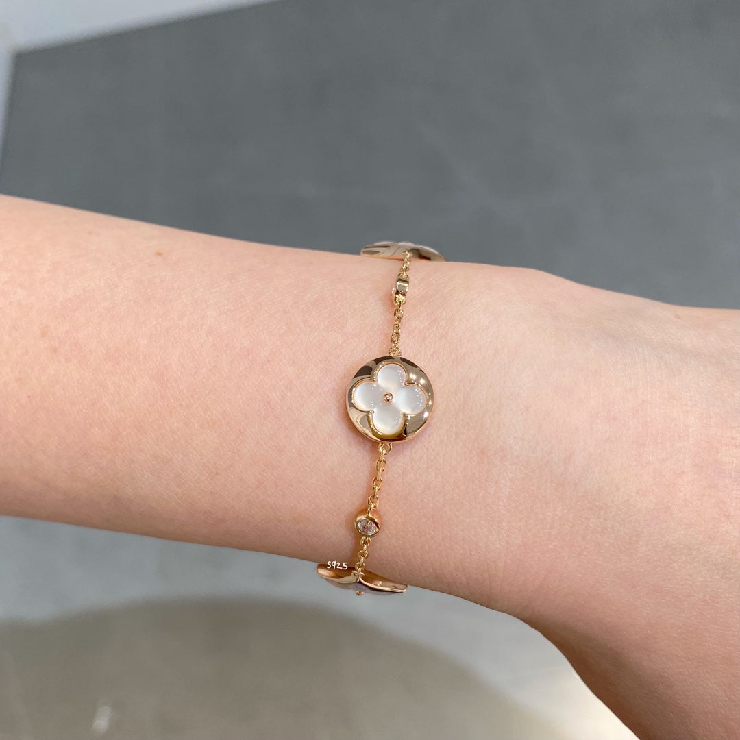 [ELAN LUXE]STAR AND SUN 4 MOTIF WHITE MOP PINK GOLD BRACELET