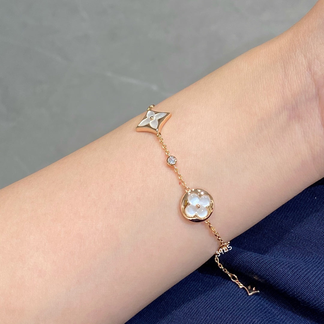 [ELAN LUXE]STAR AND SUN 4 MOTIF WHITE MOP PINK GOLD BRACELET
