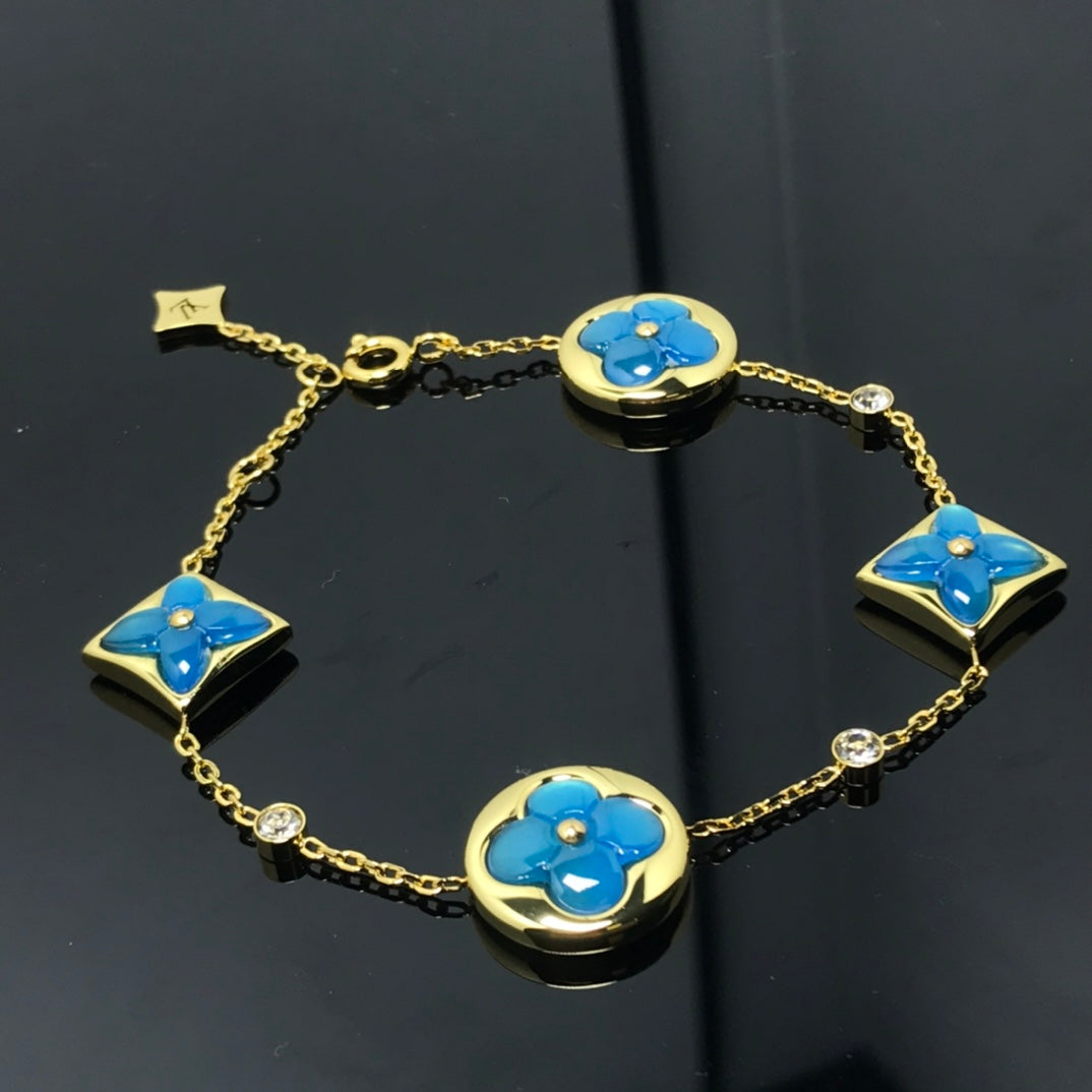 [ELAN LUXE]STAR AND SUN 4 MOTIF BLUE BRACELET